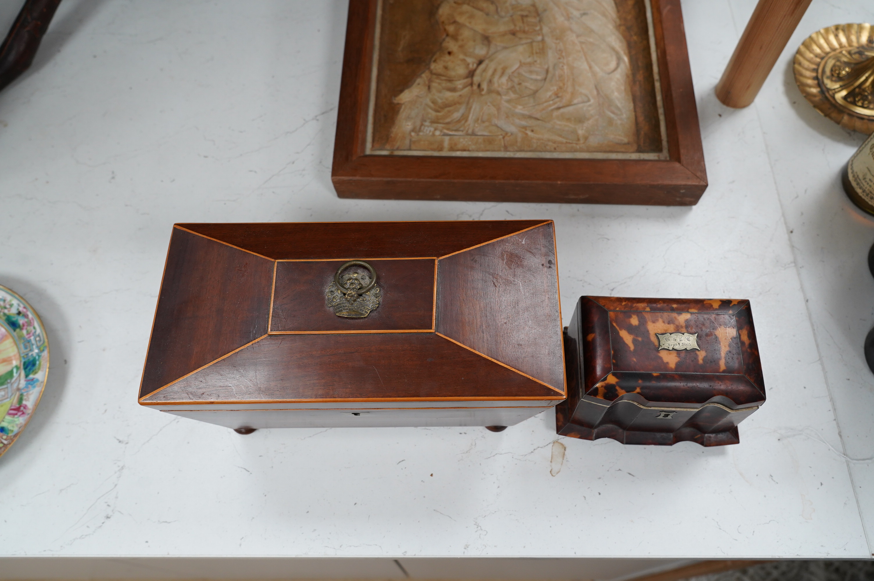 A 19th century tortoiseshell tea caddy with ivory banding together with a satinwood banded mahogany tea caddy, 28cm wide. Condition - poor to fair. CITES Submission reference MTBUUNZA